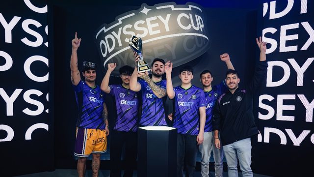 Esports team lifting a trophy